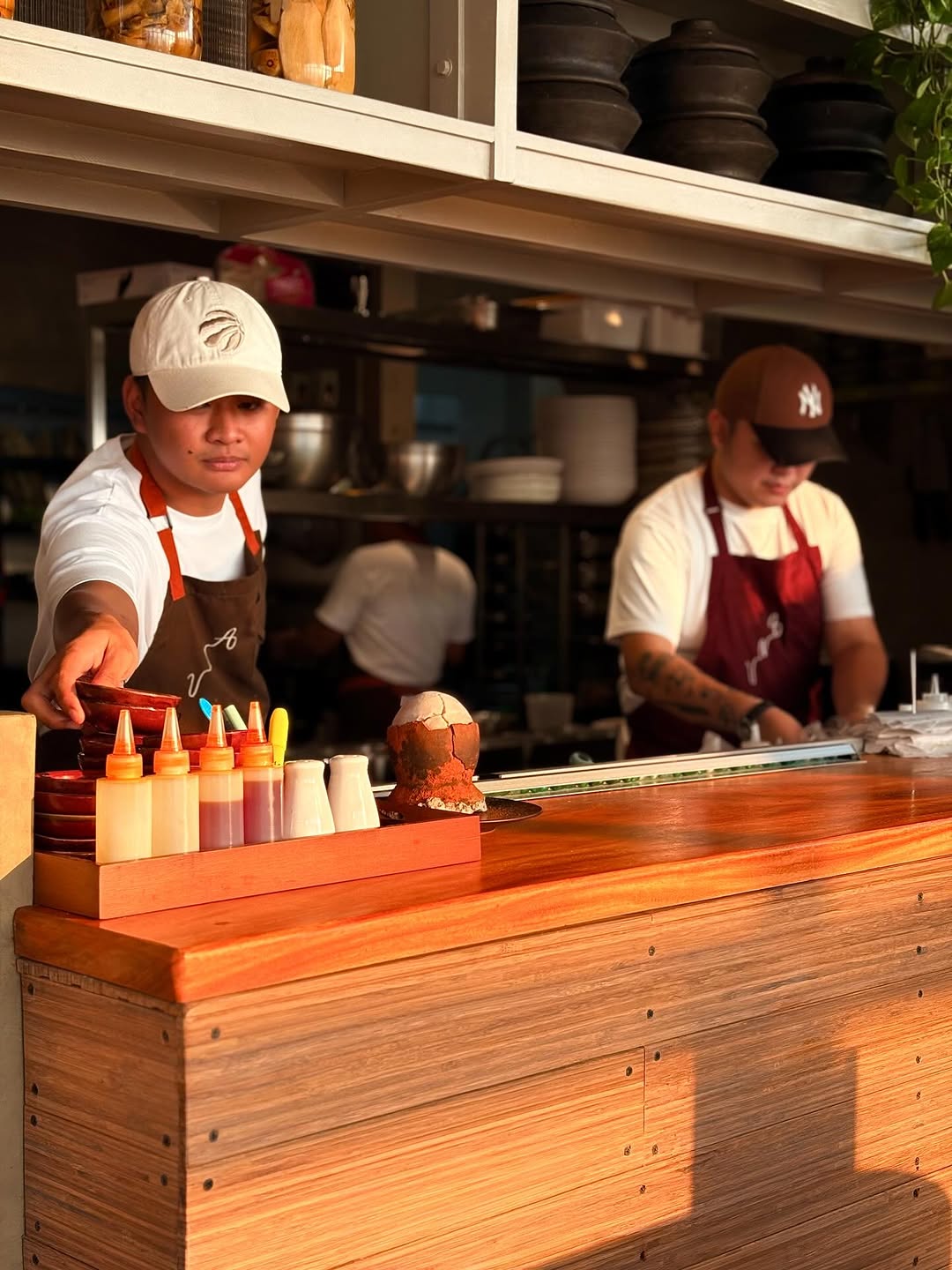 UNA kitchen team at the pass counter